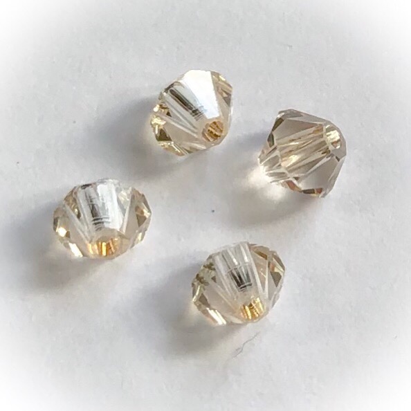 Preciosa 6mm bicone Crystal honey, 20kpl
