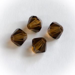 Preciosa 6mm bicone Smoke topaz, 20kpl