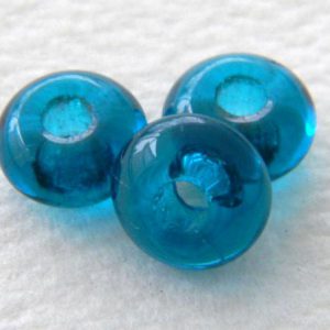 Suurireikäinen Tsekki lasi rondelli 11mm Dark aqua, 8kpl