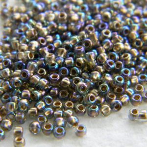 TR11.999 - Toho Gold lined rainbow black diamond