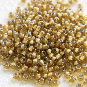 TR11.375 - Toho Inside colour topaz/lt grey lined